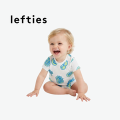 LEFTIES WHITE ROMPER WITH BEACH ELEMENT DOODLES
