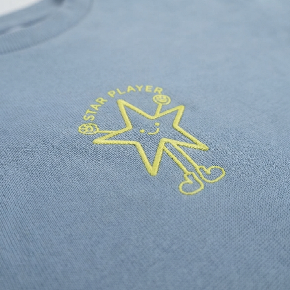 NEXT "STAR PLAYERS" LIGHT BLUE LONG-SLEEVE T-SHIRT