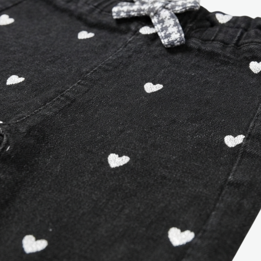 PRÉNATAL BLACK HEART-PRINT DENIM PANTS