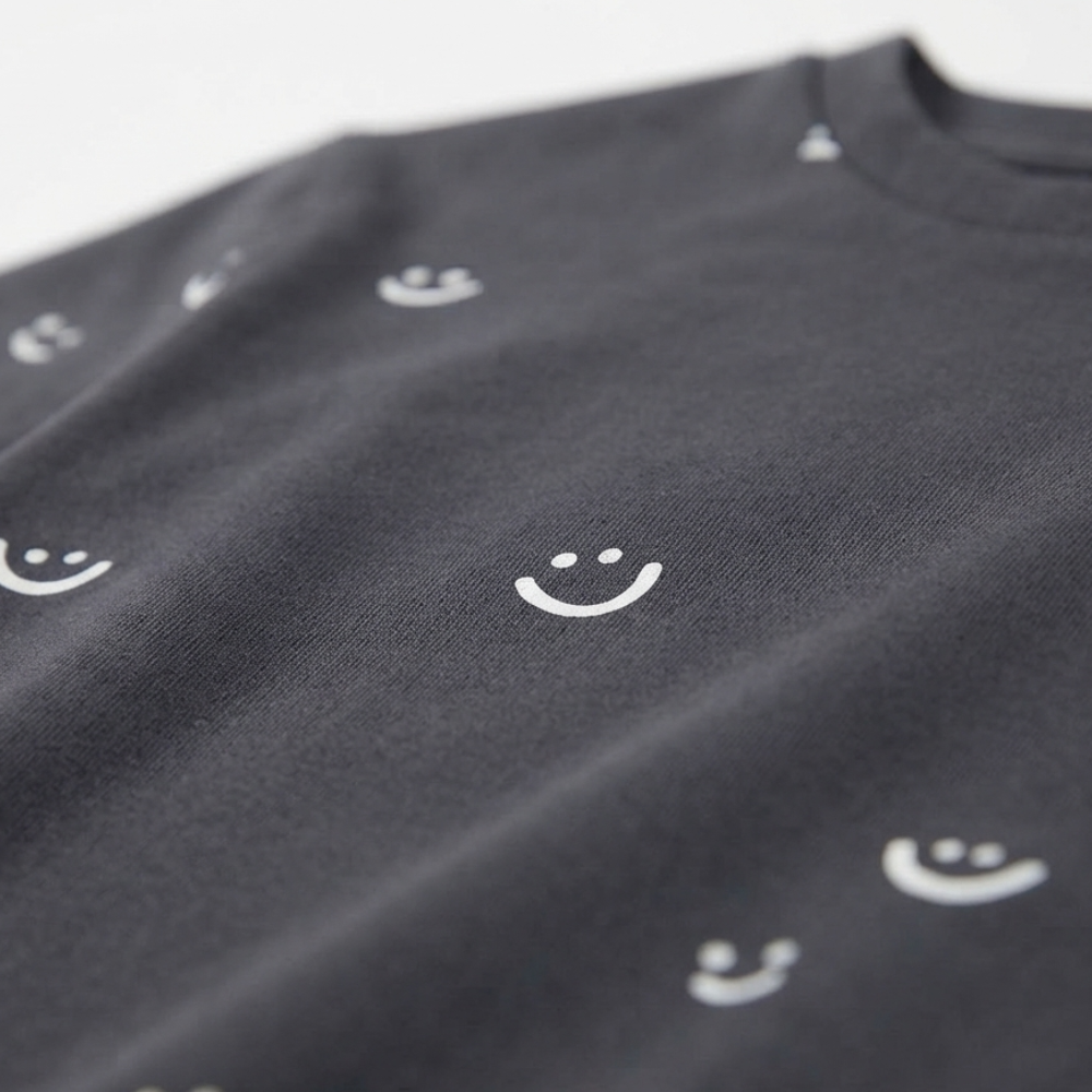 NEXT ALL-OVER SMILEY FACE DARK GREY LONG-SLEEVE T-SHIRT